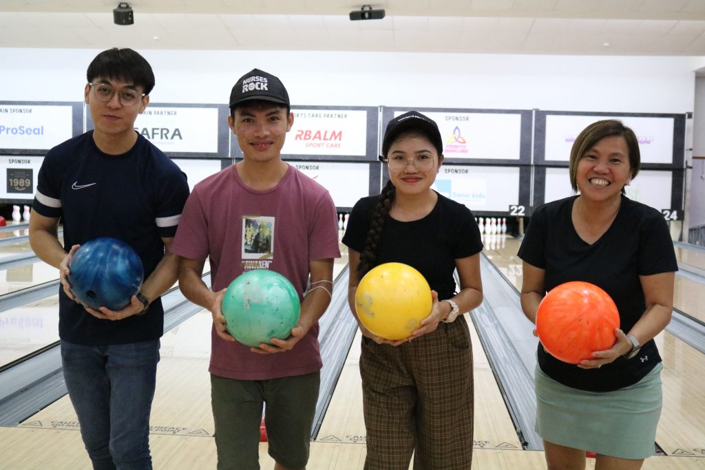 The nursing team at MWS Christalite Methodist Home along with Head Diana Ooi (far right) engaged in friendly competition at a bowling tournament held at SAFRA Yishun
