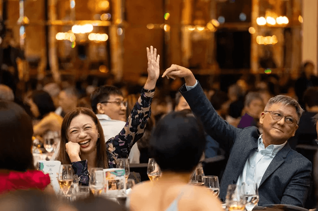 During the live auction, guests competed to secure items, including a pair of Singapore Airlines Business Class return tickets to Seattle