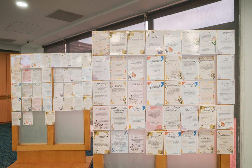 Boards containing congratulatory messages for winners penned by their fellow colleagues…