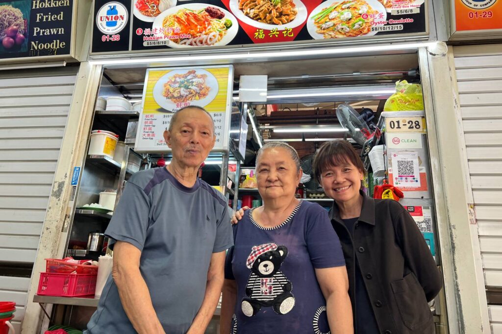 Ah Hock with his wife (middle) and Rev Ong Bee Keow, Pastor-in-Charge of Changi Methodist Church