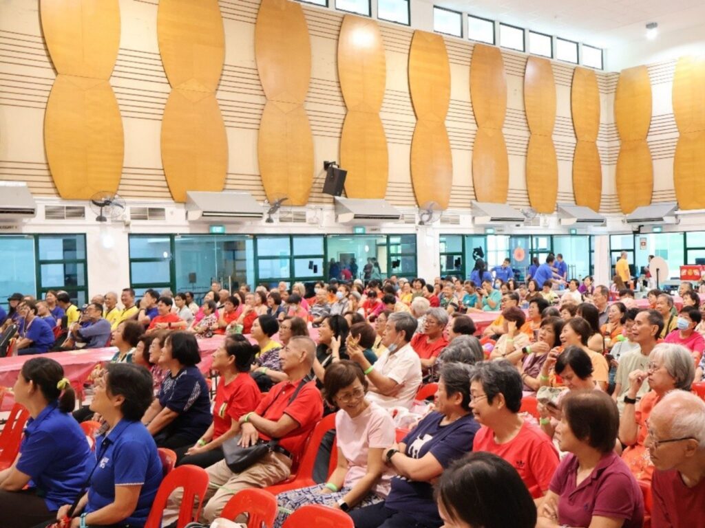 Seniors celebrate Chinese New Year in a joint event by MWS, Allkin, and NTUC Health.