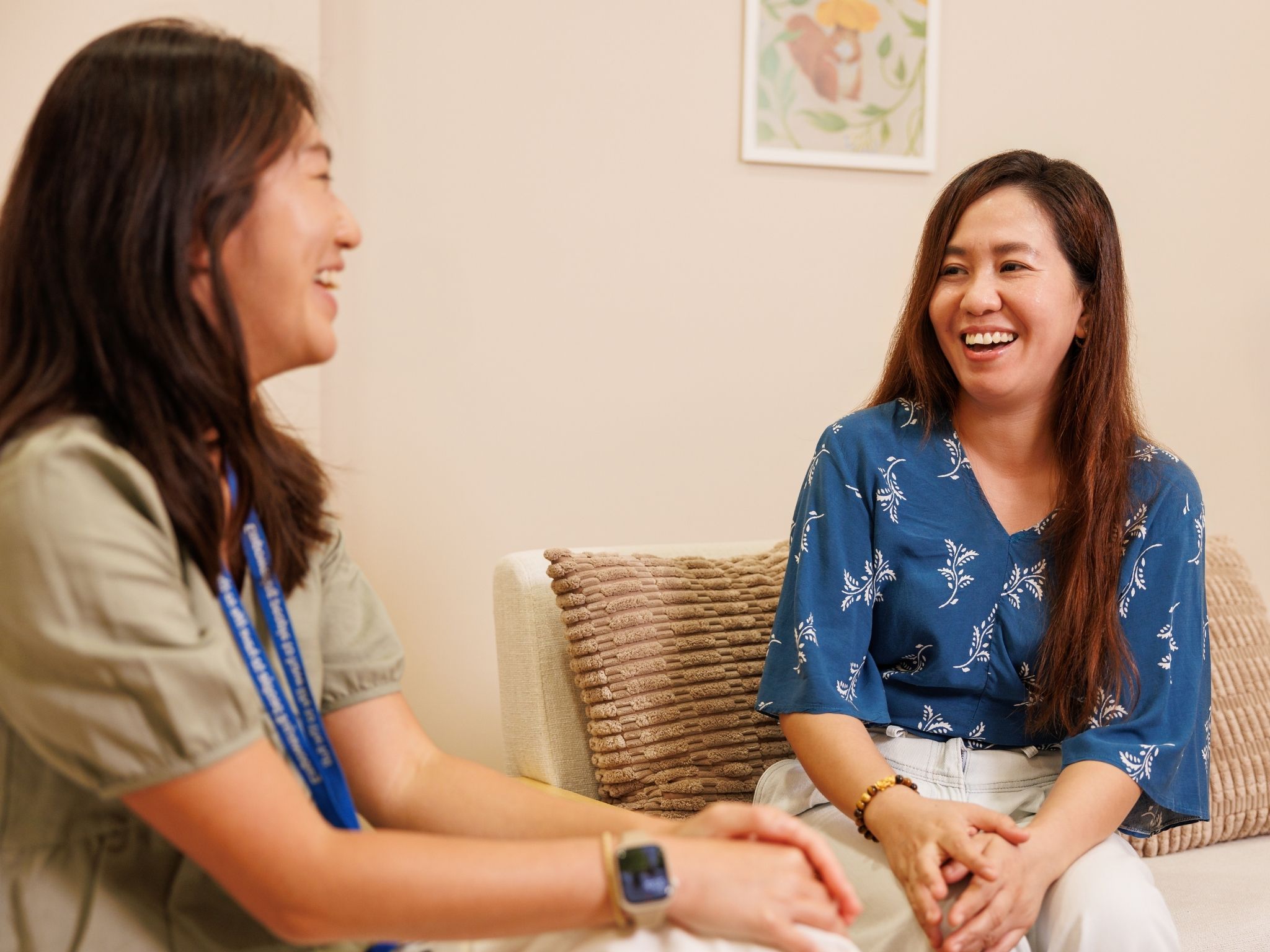 Aishah (right) with her social worker Ariel