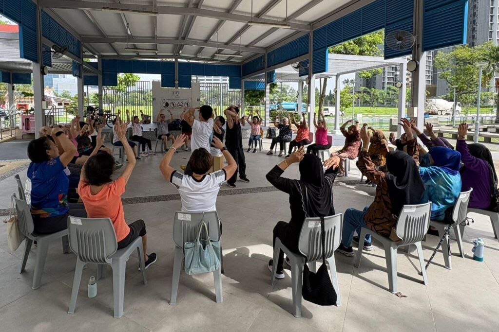 Seniors taking part in a movement-based activity