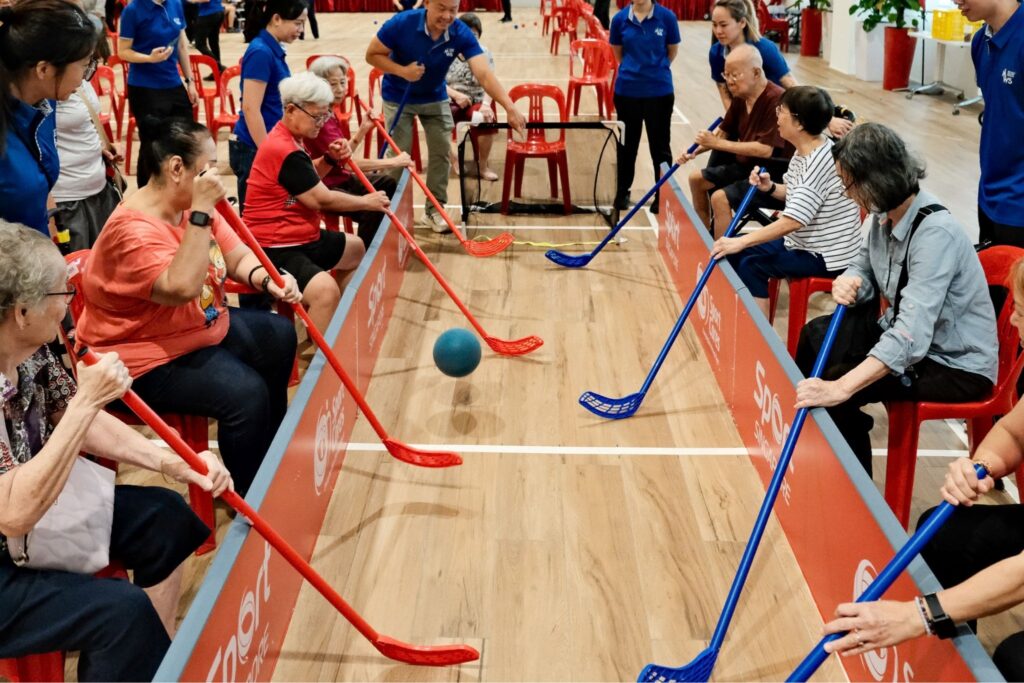 Seniors playing adaptive floorball