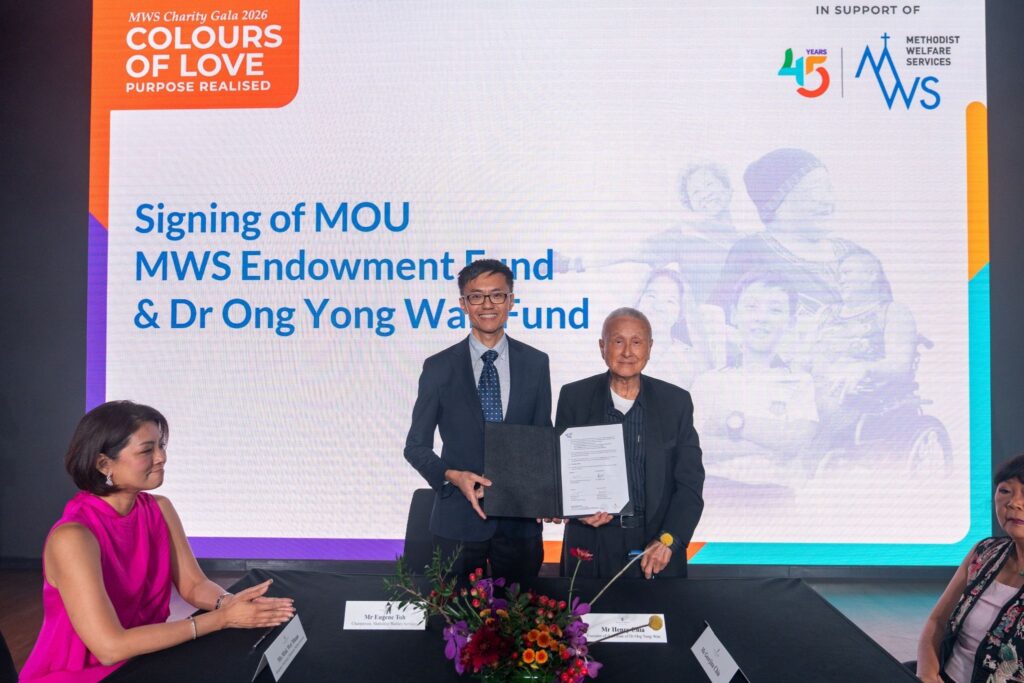 Eugene Toh, Chairperson of MWS Board of Governance (left), and Henry Chia, husband of the late Dr Ong Yong Wan and executor of Dr Ong’s estate, signing a Memorandum of Understanding to establish the MWS Endowment Fund.