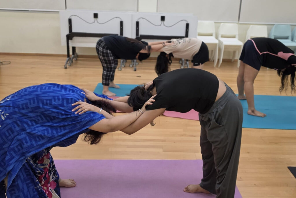 Participants practising mindfulness through movement