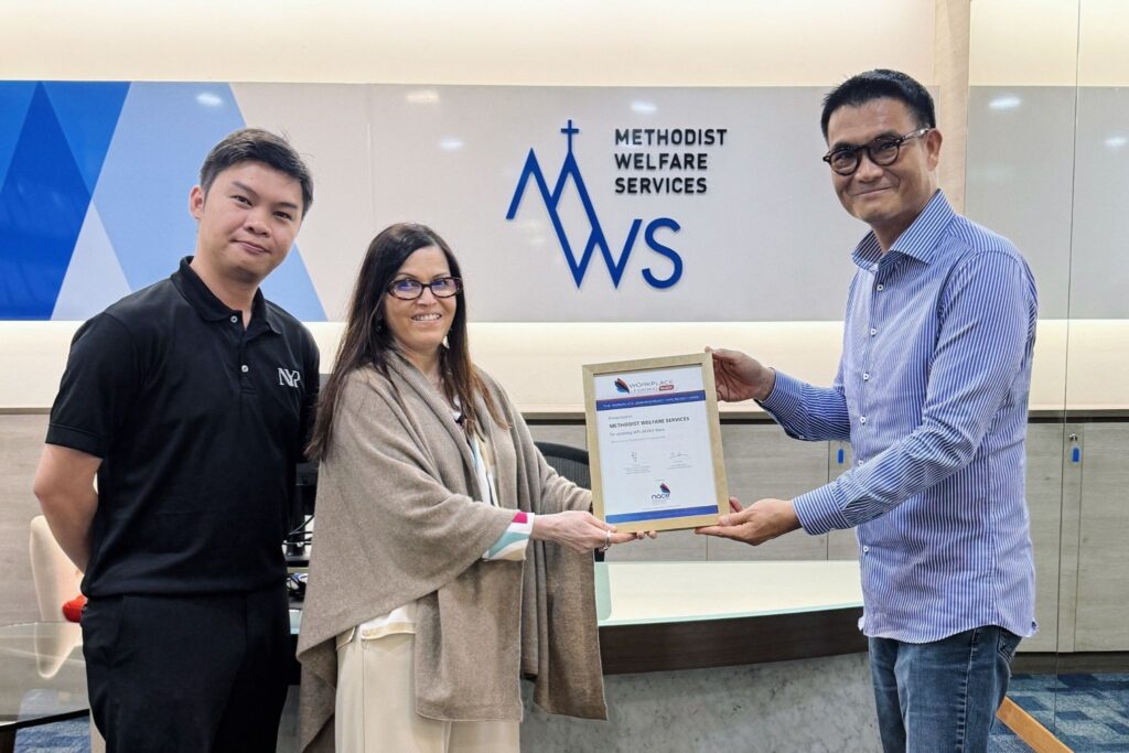 MWS CEO Calvin Ngo (right) receiving the WPL:READY Mark certification from Azizah Mohd (centre), Lead Specialist, NACE led by NYP, witnessed by Kelvin Pang (left), Business Development Manager.